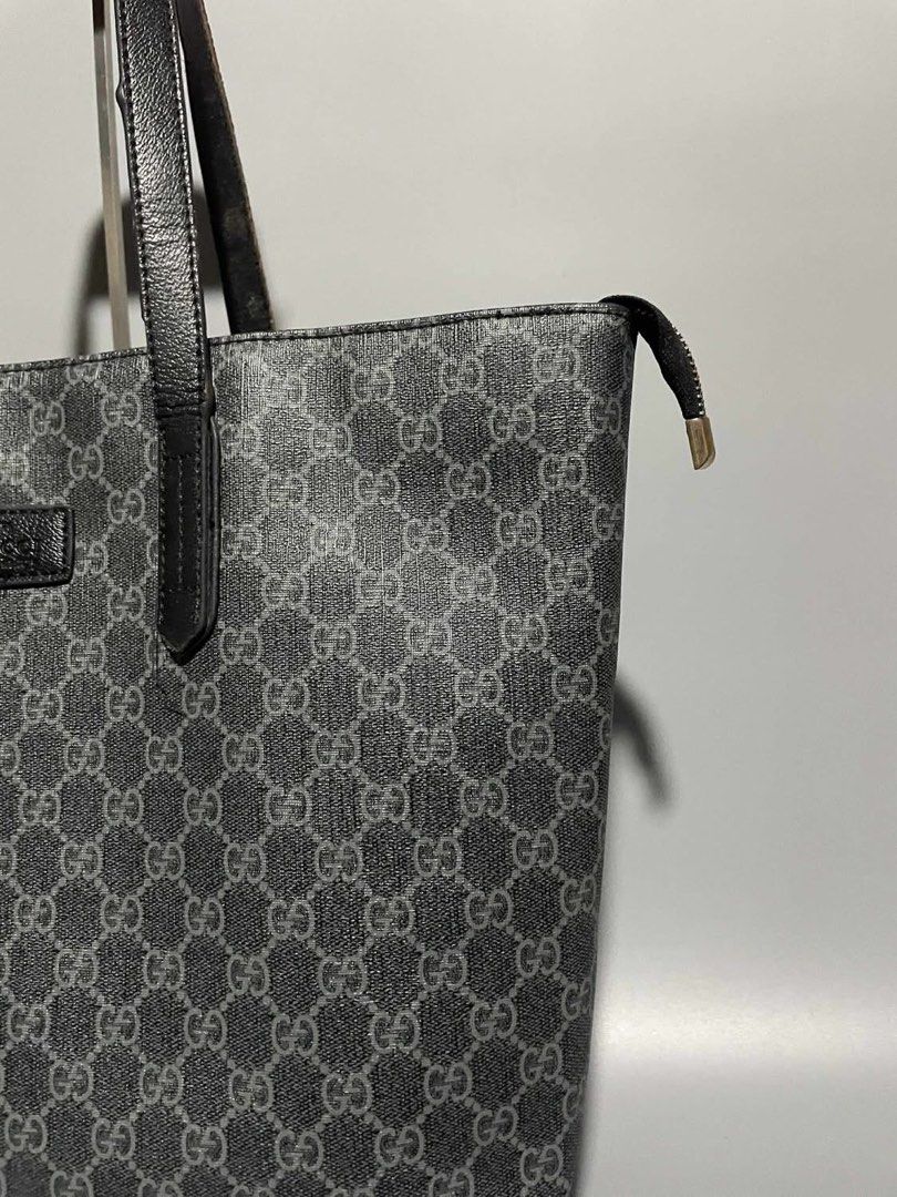 Gucci GG Supreme Tote Bag (Category: Luxury Bags & Wallets) located in Manila. Submitted by z_ware (Listing ID 1399014447, Image 3). Description: - Top Grade Gucci tote bag - Iconic GG Supreme pattern -Black leather handles and trim - Secure zipper closure - Black fabric interior lining - Includes Gucci label - Ideal for daily use -need wash .