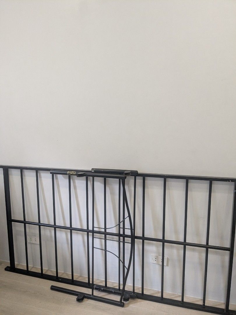 Home Suite Single Bed Rail (Category: Bed Frames & Mattresses) located in Manila. Submitted by frankmountain (Listing ID 1399034567, Image 1). Description: - Black metal bed rail - Home Suite brand - Foldable design - Suitable for single bed size - Includes main rail section and support piece - Features vertical bars for safety - Complete tools. Easy to setup - RFS: Upgrade Shipping Fee will be shouldered by the buyer..