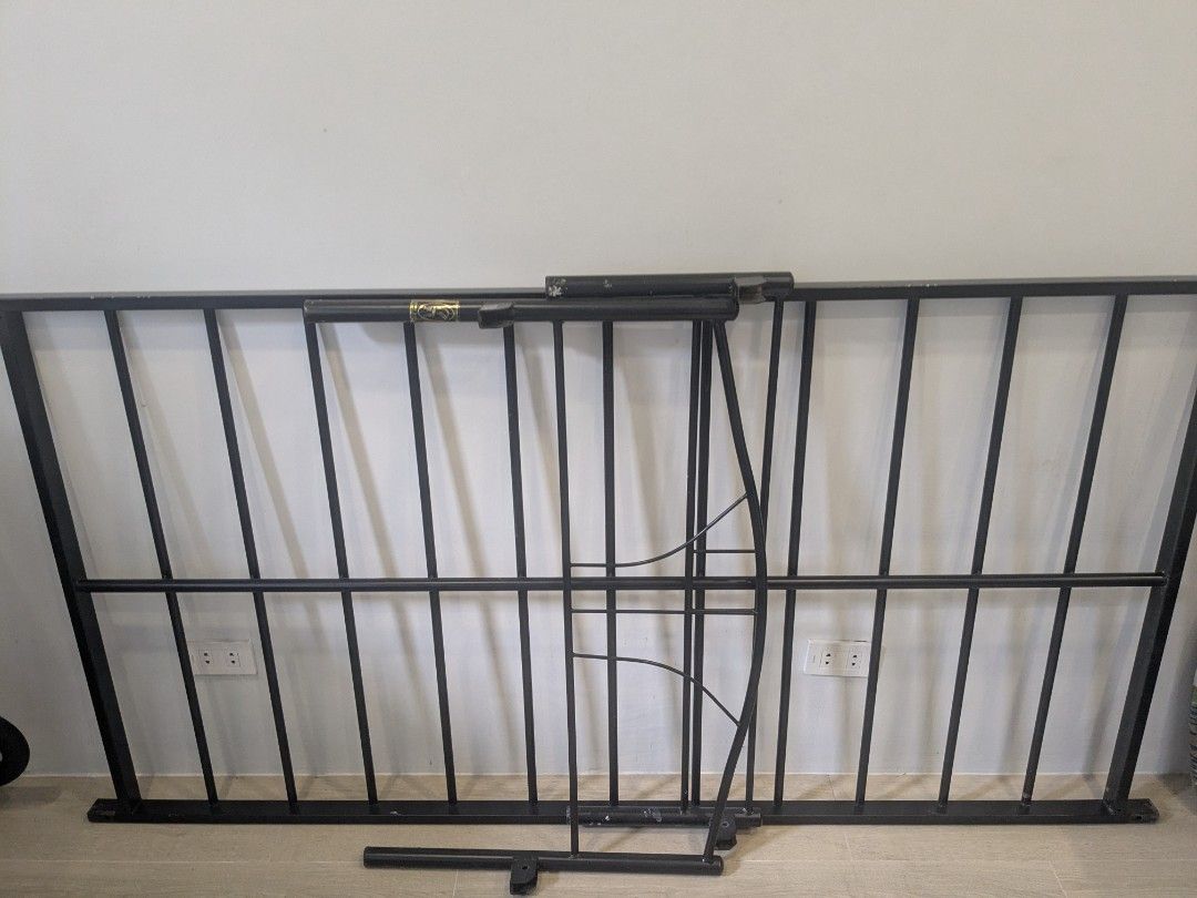 Home Suite Single Bed Rail (Category: Bed Frames & Mattresses) located in Manila. Submitted by frankmountain (Listing ID 1399034567, Image 2). Description: - Black metal bed rail - Home Suite brand - Foldable design - Suitable for single bed size - Includes main rail section and support piece - Features vertical bars for safety - Complete tools. Easy to setup - RFS: Upgrade Shipping Fee will be shouldered by the buyer..