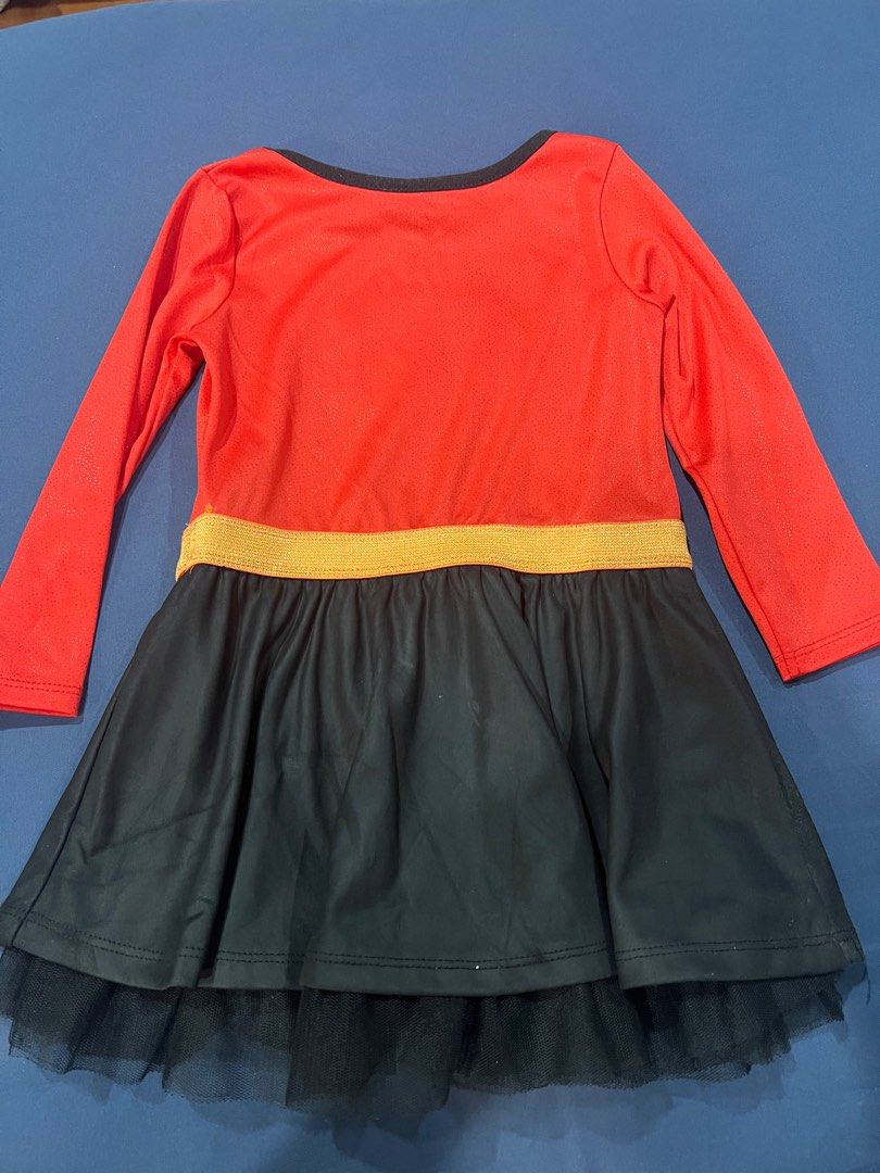 Incredibles 2 Dress - Size 2T (Category: Babies & Kids Fashion) located in Muntinlupa City. Submitted by emvn (Listing ID 1399019201, Image 2). Description: - Incredibles 2 dress - Size: 2T - Features: - Long sleeve dress - Red top with Incredibles logo, black skirt with tullr layer, gold waistband - Condition: Small hole on sleeve - Measurements: - Length: 44cm - Chest: 23cm.