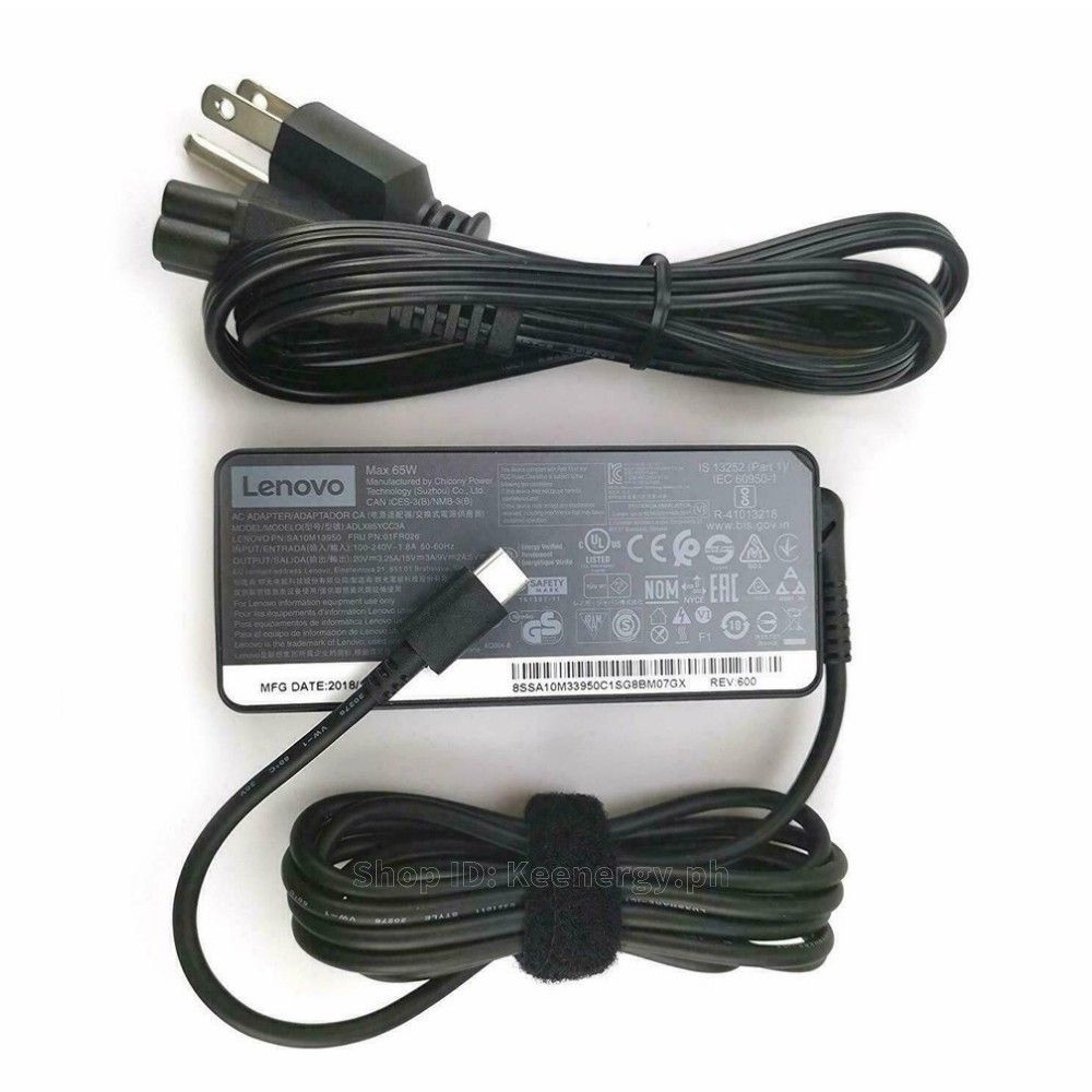 Lenovo 65W USB-C Type-C Laptop Charger (Category: Chargers) located in Cebu City. Submitted by gracemarvin06 (Listing ID 1398913690, Image 1). Description: - Lenovo 65W USB-C charger - Sleek black design - Features a USB-C connector - Includes power adapter and power cord - Compatible with Lenovo laptops with USB-C charging - Manufactured in 2018/04.