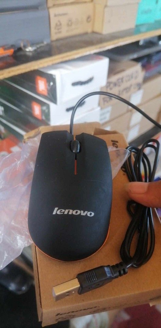 Lenovo Wired Mouse (Category: Mouse & Mousepads) located in Cebu City. Submitted by gracemarvin06 (Listing ID 1398945498, Image 3). Description: - Lenovo wired mouse - Sleek black design with orange accent - USB connector - Comes with original box - Perfect for home or office use - Easy to set up and use.