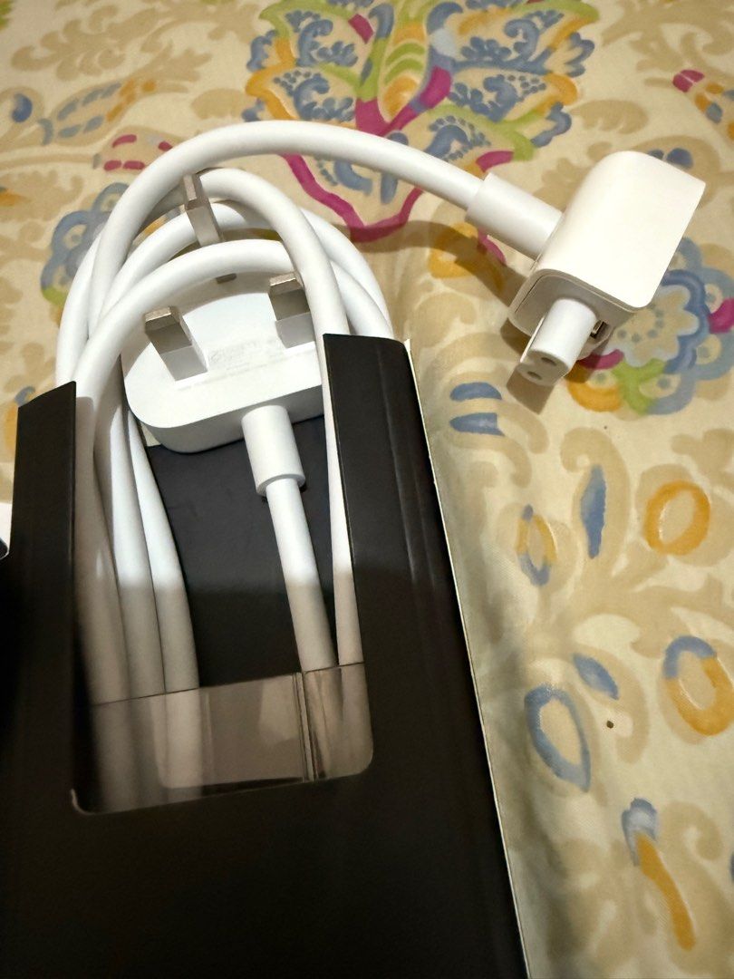 MacBook Air AC Adapter Plug and Extension Cord (Category: Cables & Adaptors) located in Rizal. Submitted by tin414 (Listing ID 1399046469, Image 3). Description: This came with my mac but I have no use for them. Original. Item in Makati CBD. 1 set is made up of: 1. Regular duckhead adapter 2. Duckhead adapter with extension cord.