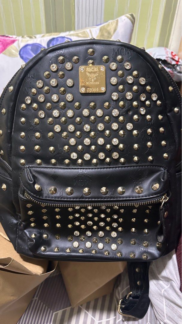 MCM- backpack vintage (Category: Luxury Bags & Wallets) located in Manila. Submitted by preloved.brand2023 (Listing ID 1398912622, Image 1). Description: Not guaranteed. Complete studs. Ukay from korea. Vintage na po. .