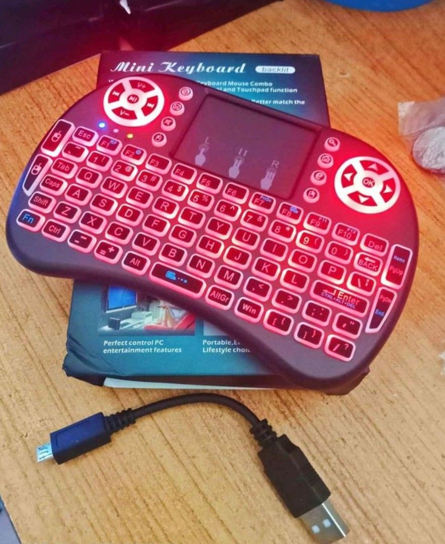Mini Wireless Keyboard Mouse Combo (Category: Computer Keyboard) located in Cebu City. Submitted by gracemarvin06 (Listing ID 1398943017, Image 1). Description: - Mini wireless keyboard - Built-in touchpad - Ideal for PC entertainment - Adjustable DPI settings - Backlight function - Includes USB receiver - Comes with charging cable.