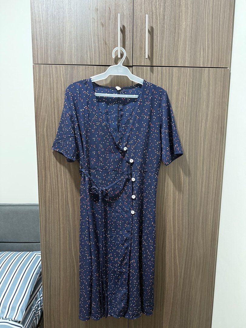 Navy Blue Polka Dot Dress Wrap Around (Category: Dresses) located in Mandaluyong City. Submitted by veronica3000 (Listing ID 1398925086, Image 1). Description: - Navy blue polka dot wrap dress - Short sleeves - Button-down front - Matching tie belt - V-neckline - Midi length - Lightweight fabric - Ideal for warm weather.