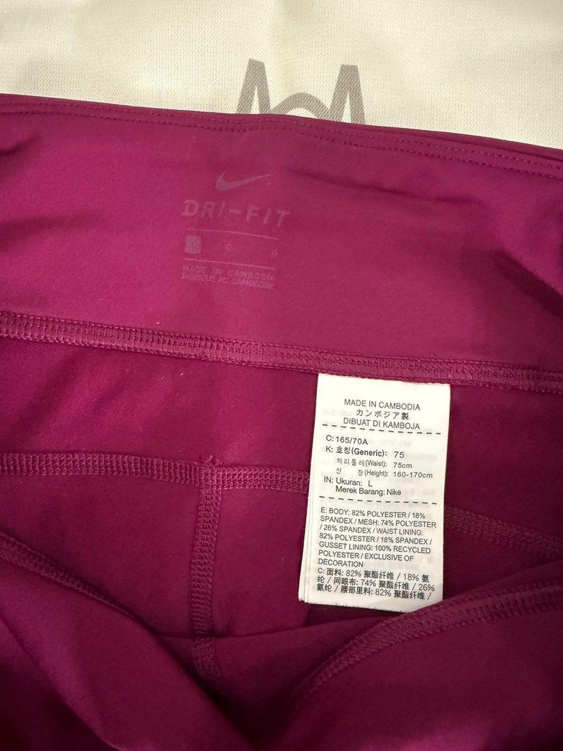 Nike Dri-FIT Leggings - Size L (Category: Activewear) located in Rizal. Submitted by iamrissa (Listing ID 1398892969, Image 2). Description: - Nike Dri-FIT leggings - Size: L - Drawstring waist - Nike logo - Unique design on lower leg - Made in Cambodia - Fabric Composition: - 82% polyester, 18% spandex - Mesh: 74% polyester, 26% spandex.