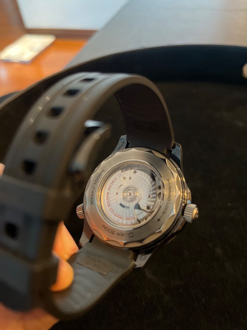 Omega Seamaster Black Ceramic Diver 300M (Category: Luxury Watches) located in Makati City. Submitted by cheeseefungu (Listing ID 1398892402, Image 3). Description: - Bought 2020, watch and box only, NO PAPERS. Can authenticate at watch check before buying - Omega Seamaster Diver 300M Watch - Black dial - Black rubber strap - Stainless steel case - Unidirectional rotating bezel - Presented in an Omega wooden box - Features the Omega logo.