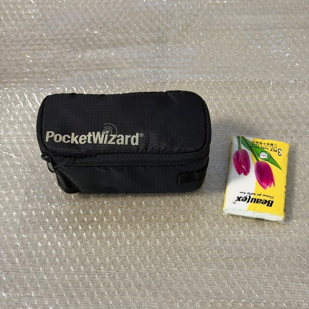 PocketWizard Case (Category: Other Photography Accessories) located in Singapore. Submitted by superseetoh (Listing ID 1398946421, Image 1). Description: - Genuine PocketWizard case - Should be PocketWizard 804-712 G-Wiz Trunk Bag (Black) - Black, zippered design - Features an internal mesh pocket - Minor marks present inside - Ideal for storing PocketWizard equipment.
