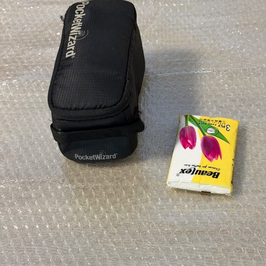 PocketWizard Case (Category: Other Photography Accessories) located in Singapore. Submitted by superseetoh (Listing ID 1398946421, Image 2). Description: - Genuine PocketWizard case - Should be PocketWizard 804-712 G-Wiz Trunk Bag (Black) - Black, zippered design - Features an internal mesh pocket - Minor marks present inside - Ideal for storing PocketWizard equipment.