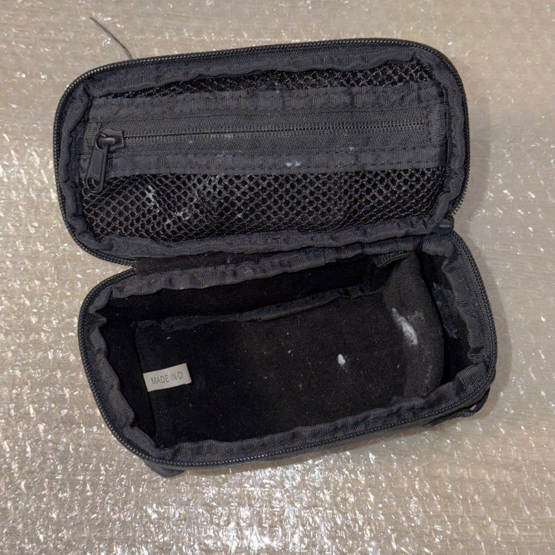 PocketWizard Case (Category: Other Photography Accessories) located in Singapore. Submitted by superseetoh (Listing ID 1398946421, Image 4). Description: - Genuine PocketWizard case - Should be PocketWizard 804-712 G-Wiz Trunk Bag (Black) - Black, zippered design - Features an internal mesh pocket - Minor marks present inside - Ideal for storing PocketWizard equipment.