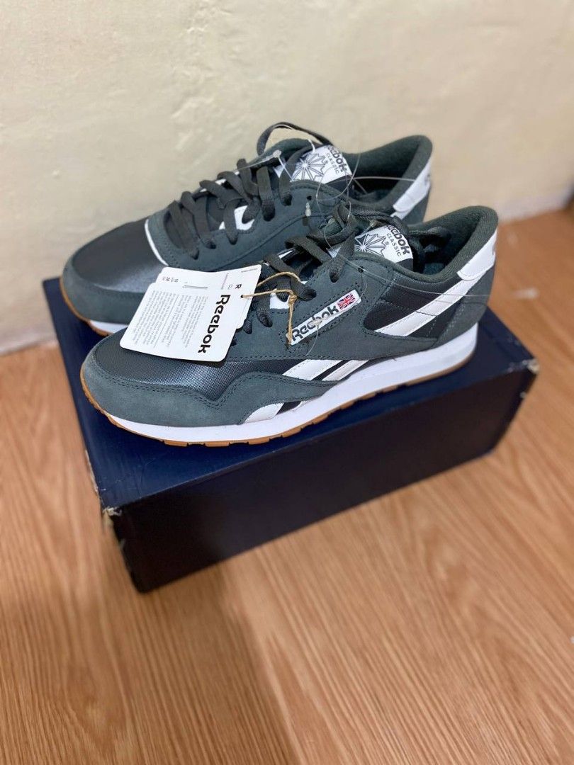 Reebok Classic Nylon Running Shoes - Grey/White (Category: Sneakers) located in Manila. Submitted by ChenG (Listing ID 1398917266, Image 1). Description: brand-new Classic Reebok Nylon running shoes in grey and white. Size 10 US. Includes original box and tags. Made in Vietnam..