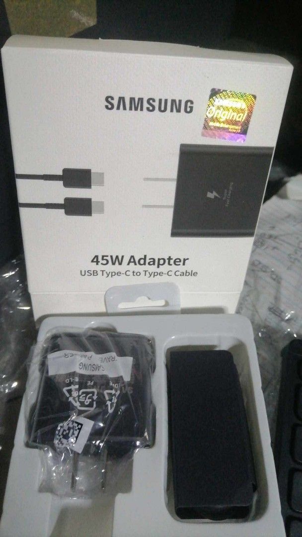 Samsung 45W Adapter USB Type-C (Category: Chargers & Cables) located in Cebu City. Submitted by gracemarvin06 (Listing ID 1398916303, Image 1). Description: - Genuine Samsung 45W Adapter - Includes USB Type-C to Type-C cable - Brand new and sealed - Fast charging capable - Perfect for fast charging your devices.
