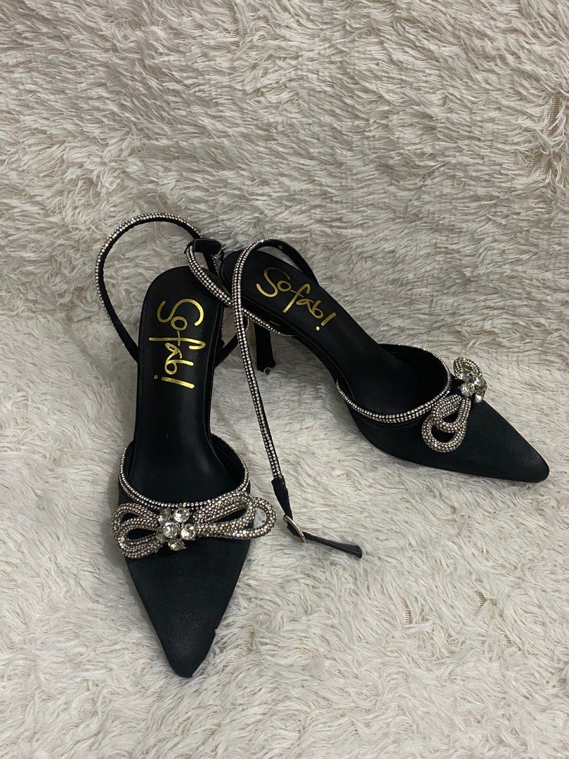 Sofab! Black Heels with Bow Detail (Category: Heels) located in Manila. Submitted by deys04 (Listing ID 1398884243, Image 1). Description: - Sofab! black heels -Unused still with price tag - Pointed toe - Delicate bow embellishment - Slingback strap with sparkling details - Brand name on insole - Ideal for special occasions - With original box Last price posted Can ship COD or COP.