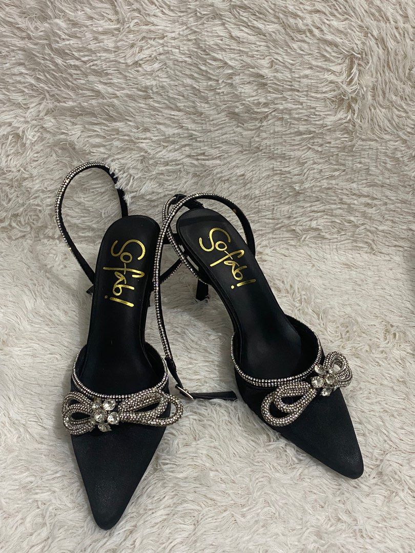 Sofab! Black Heels with Bow Detail (Category: Heels) located in Manila. Submitted by deys04 (Listing ID 1398884243, Image 2). Description: - Sofab! black heels -Unused still with price tag - Pointed toe - Delicate bow embellishment - Slingback strap with sparkling details - Brand name on insole - Ideal for special occasions - With original box Last price posted Can ship COD or COP.