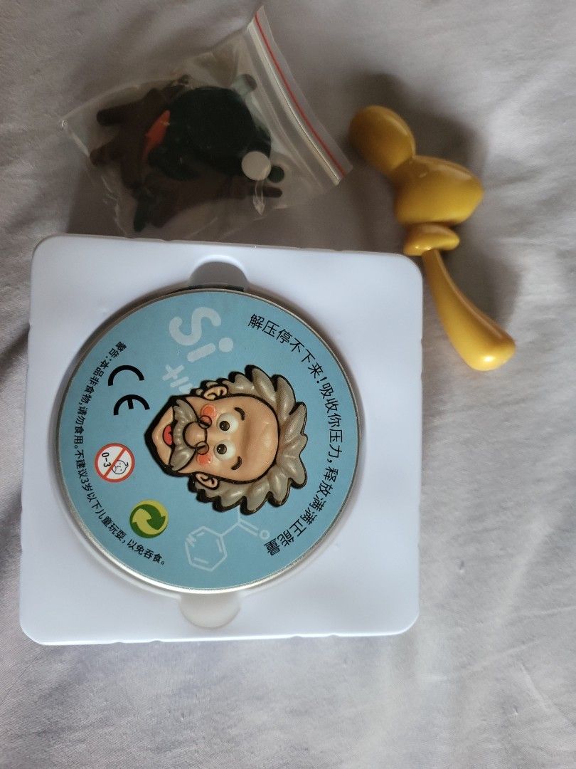 Thinking Putty - Einstein Edition (Category: Educational & Learning Toys) located in Singapore. Submitted by tiger05 (Listing ID 1398972471, Image 2). Description: - Brand new Einstein Thinking Putty set. - Includes putty, a small toy, and a yellow accessory. - Fun and educational! - Perfect for kids aged 3+. - Unopened and ready to play!.