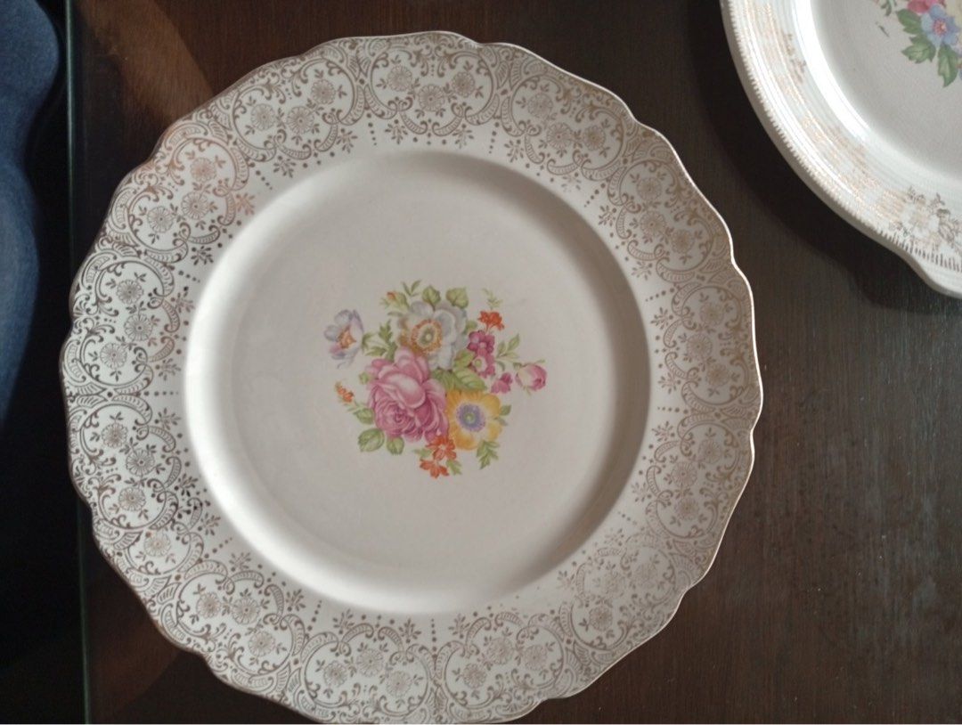 Vintage Lajean Dinner Plate (Category: Dinnerware & Cutlery) located in Bulacan. Submitted by dearphoenix (Listing ID 1399003234, Image 1). Description: - One Vintage dinner plate from Cannonsburg Pottery, USA. - 22k karat gold warranted - Features a floral center design. - Elegant gold-colored, ornate rim. - Scalloped edge. - Brand and model marked on the back. - Perfect for vintage tableware collections. - P1,500 negotiable - For pick up only o