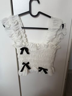 白色蝴蝶結短版上衣64210292018819110