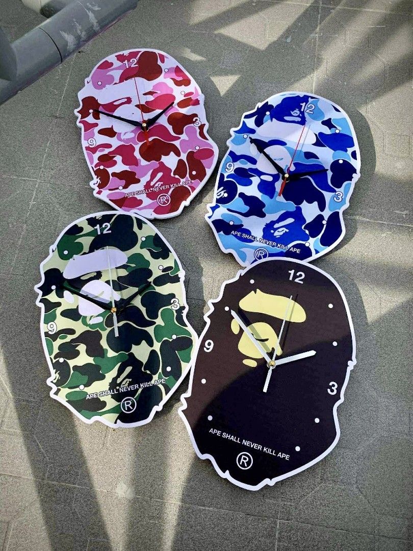 A Bathing Ape Wall Clock (Category: Wall Decor) located in Manila. Submitted by soledout_kicks (Listing ID 1399201264, Image 2). Description: A Bathing Ape Wall Clock 🦍 - Pink - Blue -Green Camou - Og logo Brown 8X11 50mm board metal clock mechanism FOR WHOLESALE PRICE 📥 BULK ORDERS SHIPPING NATIONWIDE 🇵🇭 SAME DAY DELIVERY🛵.
