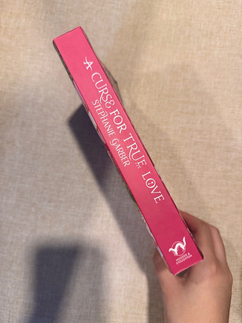 A Curse for True Love by Stephanie Garber (Category: Storybooks) located in Pasig City. Submitted by lovedpicks (Listing ID 1399202400, Image 3). Description: - 'A Curse for True Love' by Stephanie Garber 🏹🍎 From the Once Upon a Broken Heart trilogy -Authentic -Pink cover edition mode of payment: gcash.
