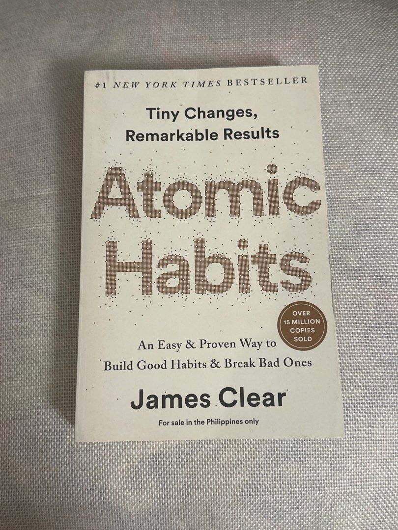 Atomic Habits by James Clear (Category: Storybooks) located in Manila. Submitted by _prelovedbyyan (Listing ID 1399076521, Image 1). Description: - Atomic Habits by James Clear - Easy guide to building good habits - Proven methods to break bad habits - New York Times bestseller - Over 15 million copies sold - For sale in the Philippines only.