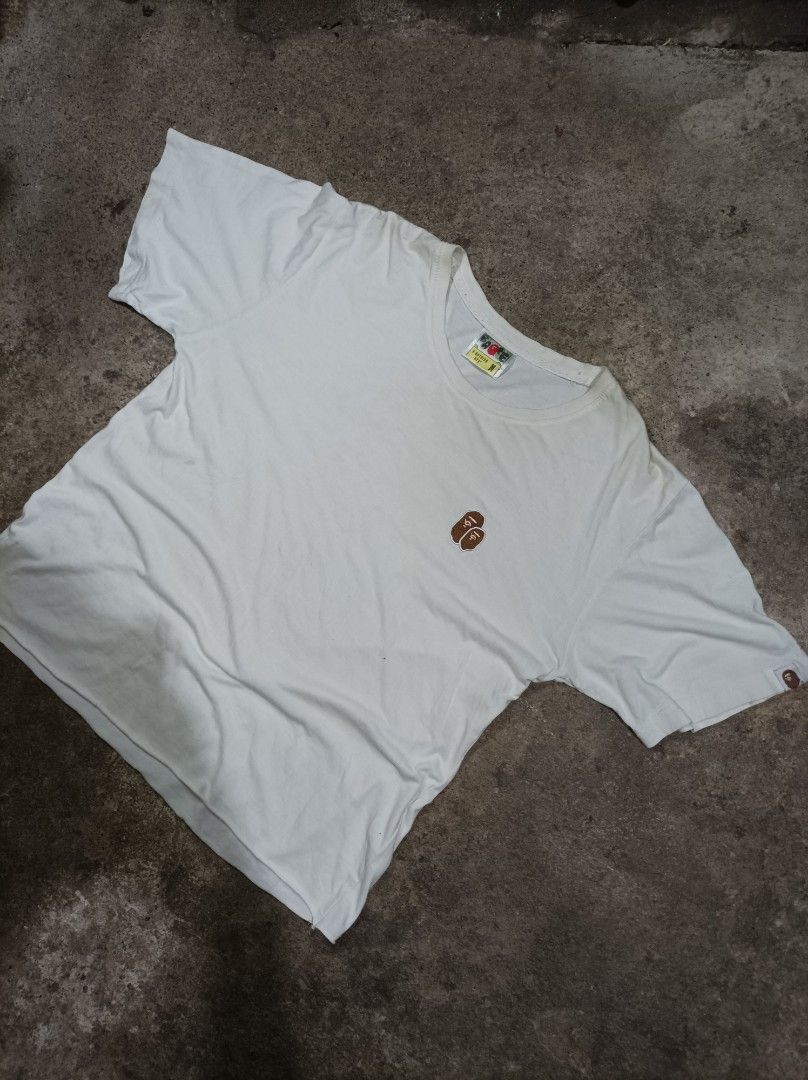 BAPE T-shirt - Medium (Category: Tshirts & Polo Shirts ) located in Digos. Submitted by lester21. (Listing ID 1399057300, Image 1). Description: - White BAPE T-shirt - Size: M - Small logo on chest and sleeve - Crew neck - Material: Cotton.