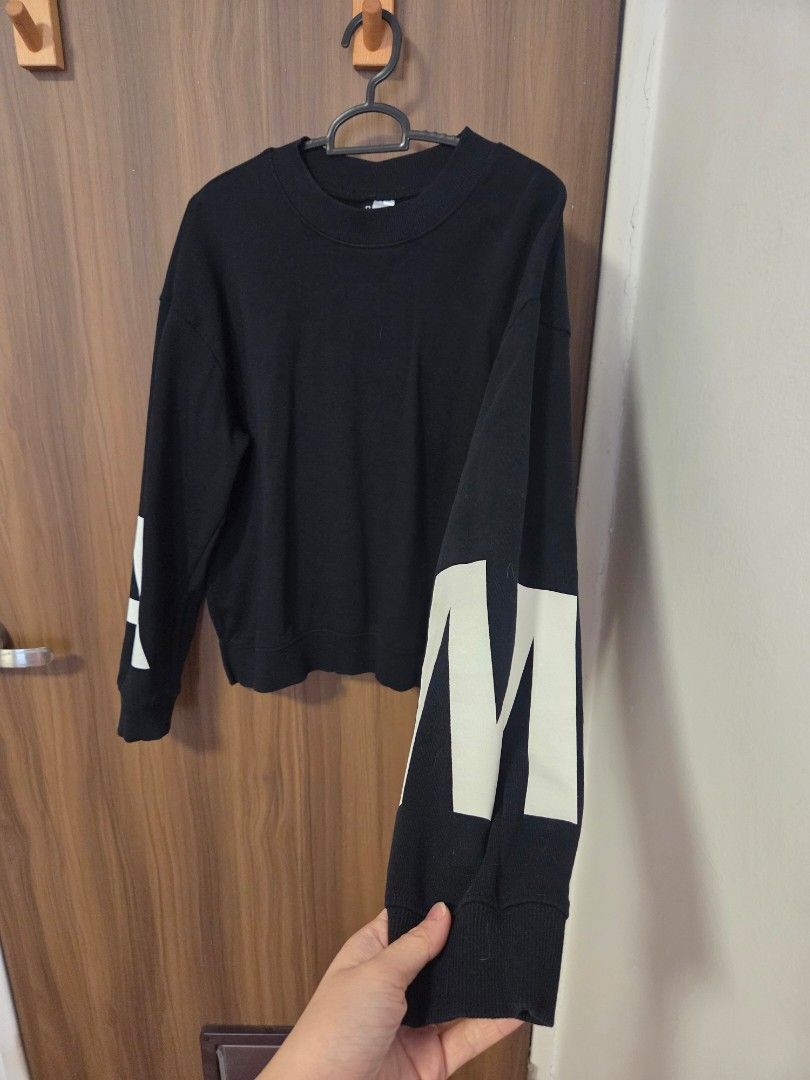 Black pullover (Category: Longsleeves) located in Singapore. Submitted by catntats (Listing ID 1399050720, Image 3). Description: price includes tracked shipping 60cm long 52cm ptp drop shoulder fleece lining, medium thickness letters M & A on arms selling to clear clost space! # sweater jumper crew neck .
