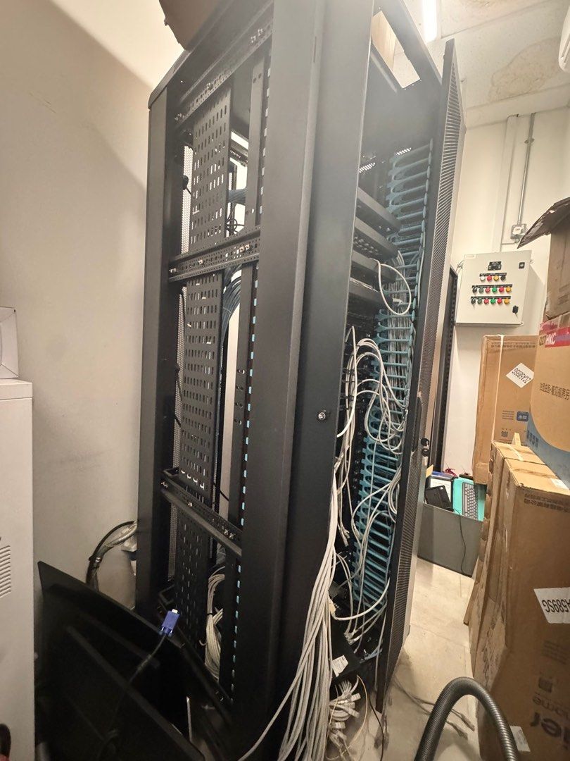 Black Server Rack (Category: Shelves, Cabinets & Racks) located in Singapore. Submitted by ecin0121 (Listing ID 1399080462, Image 2). Description: - Large black server rack - Features mounting rails - Perfect for network equipment - Ideal for home or office.