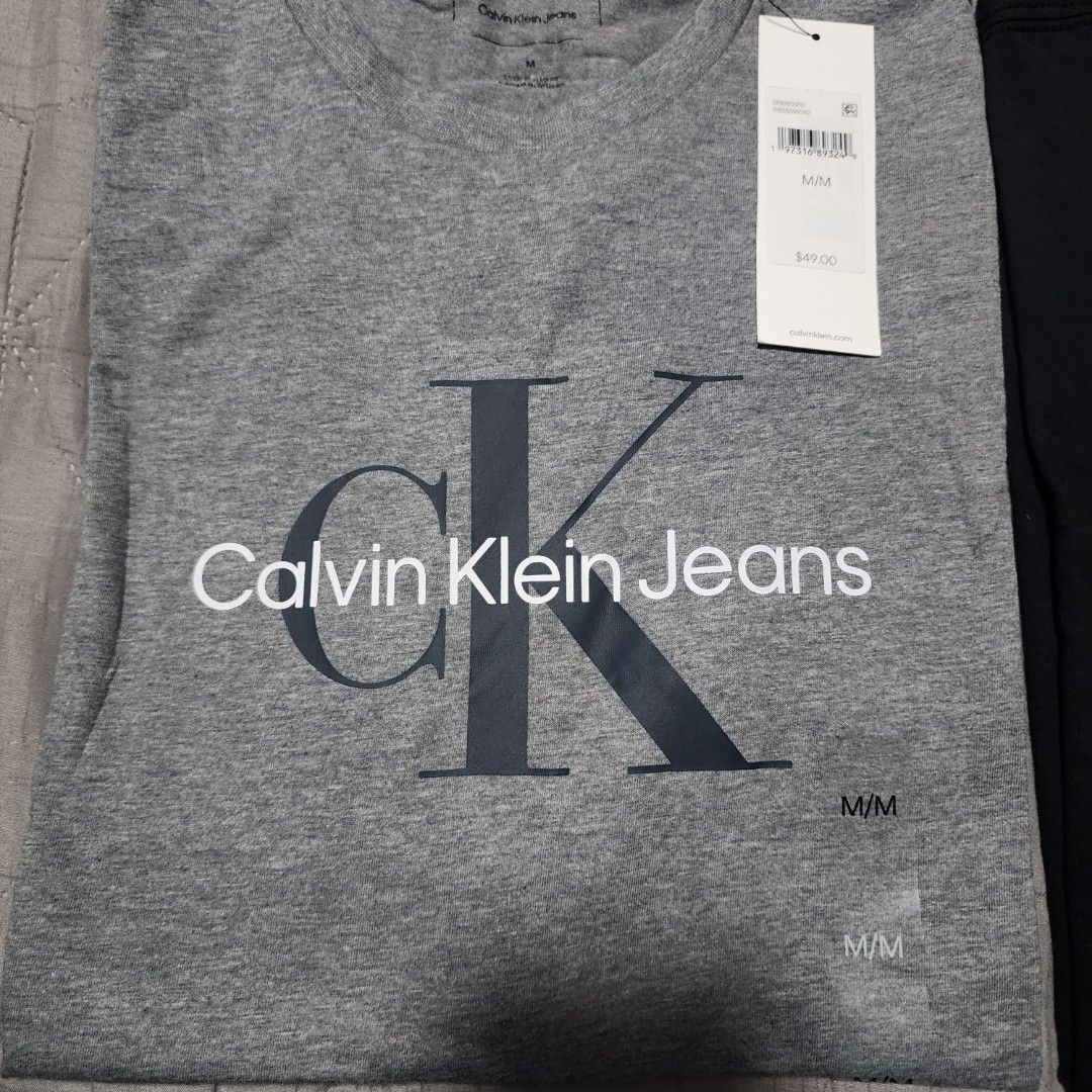 Calvin Klein (Category: Tshirts & Polo Shirts ) located in Manila. Submitted by zamken21 (Listing ID 1399175392, Image 1). Description: Brandnew with tag original from canada size Mediun W21 L27 Gray No paper bag MOP : gcash, Maya , Unionbank Shipping : j&t , lbc meetups : Paco , Pedro gil, Rob Ermita.