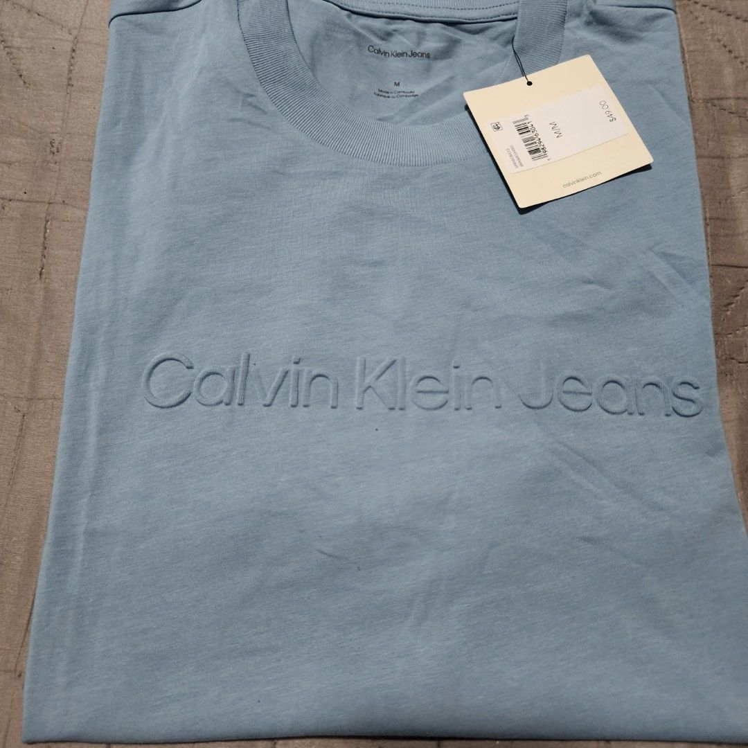 Calvin Klein (Category: Tshirts & Polo Shirts ) located in Manila. Submitted by zamken21 (Listing ID 1399177331, Image 2). Description: Brandnew with tag original from canada size Medium W21 L27 Large W22 L28 Light Blue No paper bag MOP : gcash, Maya , Unionbank Shipping : j&t , lbc meetups : Paco , Pedro gil, Rob Ermita.