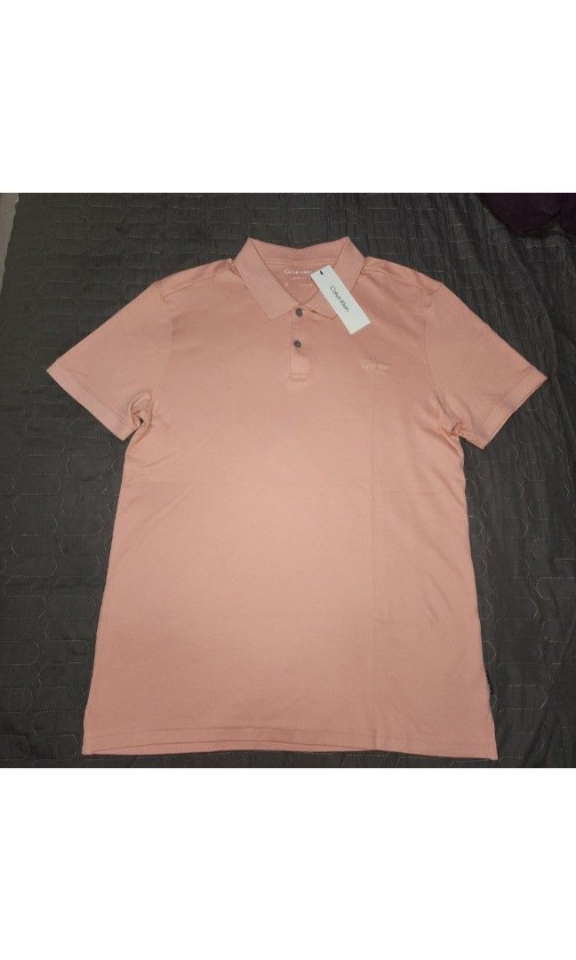 Calvin Klein (Category: Tshirts & Polo Shirts ) located in Manila. Submitted by zamken21 (Listing ID 1399178874, Image 1). Description: Brandnew with tag original from canada size Small W21 L27.5 Pink No paper bag MOP : gcash, Maya , Unionbank Shipping : j&t , lbc meetups : Paco , Pedro gil, Rob Ermita.