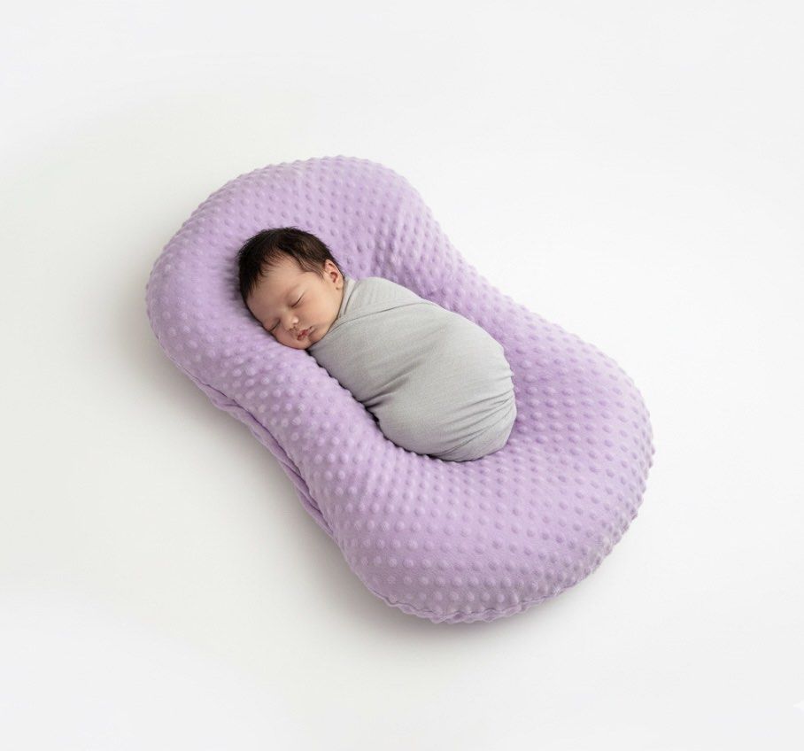 Cocoon Baby Lounger with 2 Covers (Category: Other Kids Furniture) located in Cavite. Submitted by cielinesid (Listing ID 1399065083, Image 2). Description: - Cocoon Baby Lounger (includes two covers) - Soft, purple design - Designed to cradle and support newborns - Provides a comfortable resting spot - Price: Php 700.