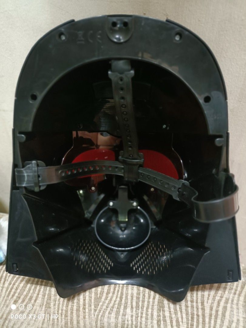 Darth Vader Voice Changer Mask (Category: Western Merchandise) located in Pasig City. Submitted by heidedieh (Listing ID 1399050070, Image 3). Description: Working ‼️ both button works perfectly clear voice changer ⭐ plays signature movie phrases and breathing sound effects. ⭐⭐ Ask the seller for video sample of voice records ‼️ Minor issues missing top cover for batts (see pic) light scratches.