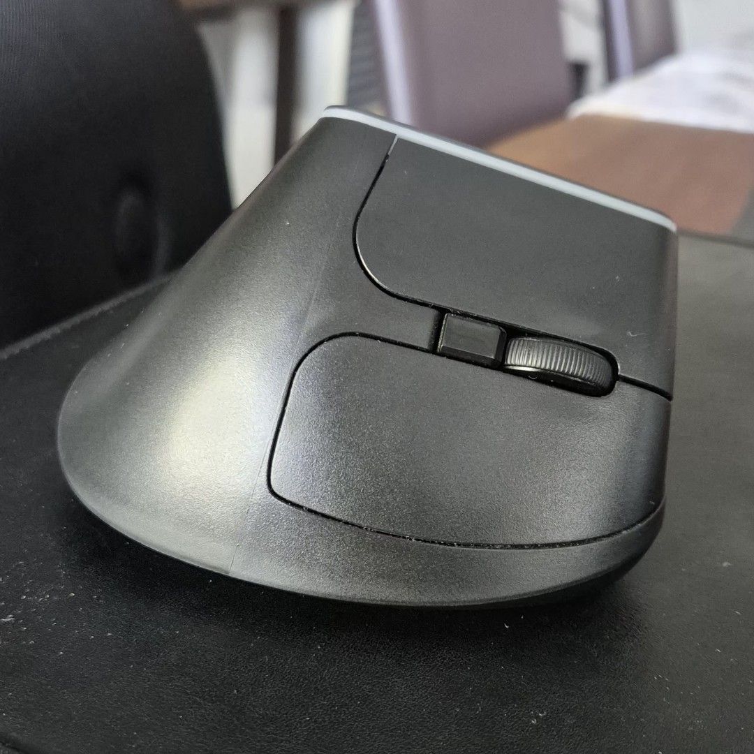 Delux Vertical Ergonomic Mouse (Category: Mouse & Mousepads) located in Paranaque City. Submitted by bmonte07 (Listing ID 1399083801, Image 2). Description: ❗️ PLEASE NOTE: Scroll wheel does not work. - Ergonomic vertical mouse from Delux. - Comfortable design for reduced strain. - Designed for extended use. - Includes original box..
