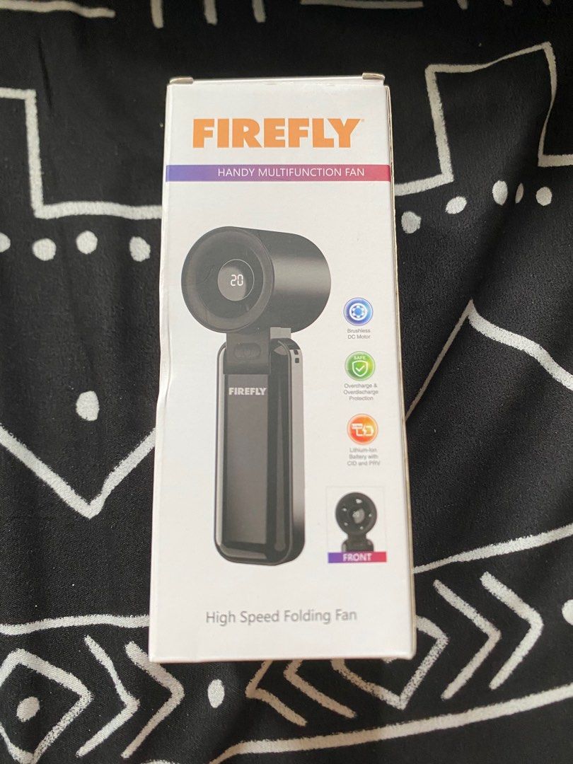 Firefly Handy Multifunction Fan (Category: Fans) located in Quezon City. Submitted by stefsm (Listing ID 1399055504, Image 1). Description: ORIGINAL. Won sa raffle - High-speed folding fan - Features a brushless DC motor for efficient performance - Digital display to show fan speed - Equipped with overcharge and overdischarge protection - Includes a lithium-ion battery with CID and PTC safety features - Compact and portable design.