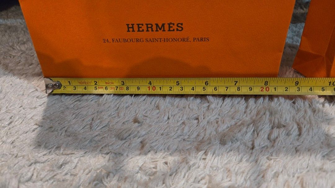 Hermes Paper bags (Category: Luxury Accessories) located in Paranaque City. Submitted by karenmn (Listing ID 1399131317, Image 2). Description: Authentic Hermes paper bags - From GB boutique - Features the classic Hermes orange color - Available in two sizes (see photos for exact measurements) - Excellent condition - Ideal for gifting or personal use Asking: Php 1,000 + sf No rush pls MOP: Gcash SF c/o buyer.