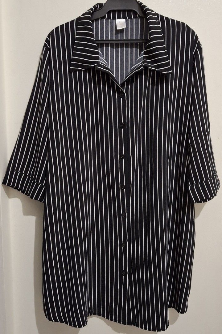 HTP Striped Button Down Polo 3/4 Dress (XL) (Category: Dresses) located in Makati City. Submitted by monaepark (Listing ID 1399134038, Image 1). Description: HTP Black striped button down polo 3/4 dress - Only used once. In very good condition. - Good for semi-formal or corporate events - Made of thick georgette fabric - Collared neckline - 3/4 sleeves with folded cuffs - Made in the Philippines Original price: 450 pesos Bust size: 38-40 inches L
