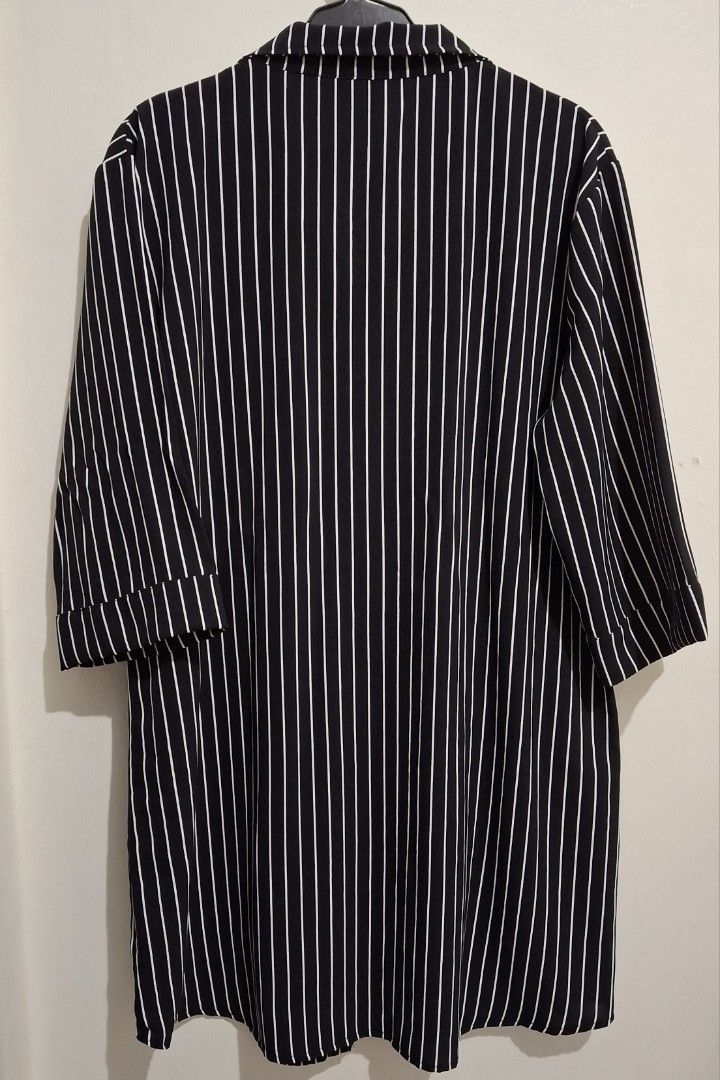 HTP Striped Button Down Polo 3/4 Dress (XL) (Category: Dresses) located in Makati City. Submitted by monaepark (Listing ID 1399134038, Image 2). Description: HTP Black striped button down polo 3/4 dress - Only used once. In very good condition. - Good for semi-formal or corporate events - Made of thick georgette fabric - Collared neckline - 3/4 sleeves with folded cuffs - Made in the Philippines Original price: 450 pesos Bust size: 38-40 inches L