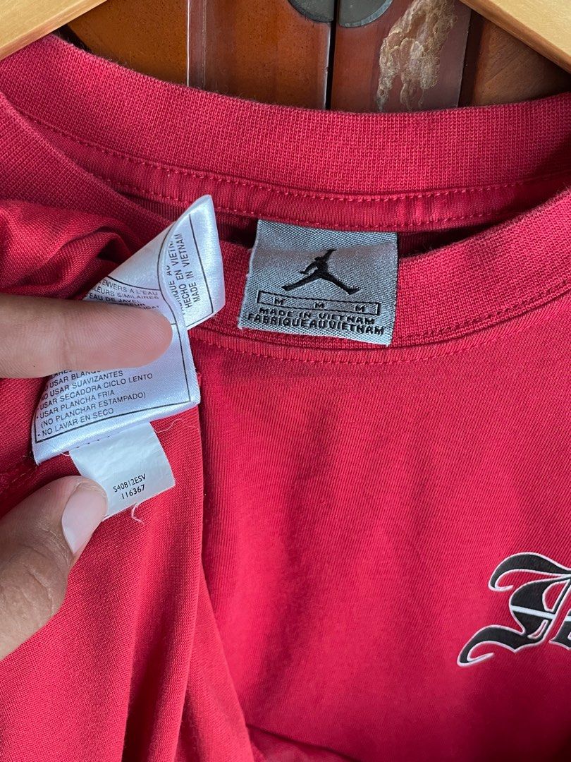 Jordan Red T-shirt - Size M (Category: Tshirts & Polo Shirts ) located in Cabadbaran. Submitted by jhen_anthon (Listing ID 1399216687, Image 3). Description: - Authentic Jordan t-shirt - Color: Red - Size: M - Made in Vietnam - Material: 60% Cotton, 40% Polyester - Features a crew neck - Jordan logo on the front.