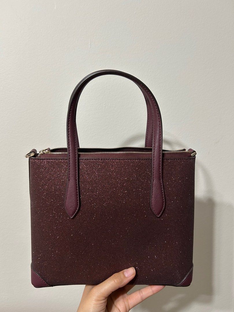 Kate Spade Satchel Maroon Glitter (Category: Luxury Bags & Wallets) located in Manila. Submitted by firesupply.ph (Listing ID 1399218562, Image 3). Description: ✨ Kate Spade Glitter Set – Satchel ✨ WALLET IS SOLD!!! In excellent condition! Perfect for both everyday use and special occasions. 💕 Details: - Authentic Kate Spade New York - Matching handbag and wallet - Gorgeous maroon glitter finish - Zero to minimal signs of use, still looks new - 