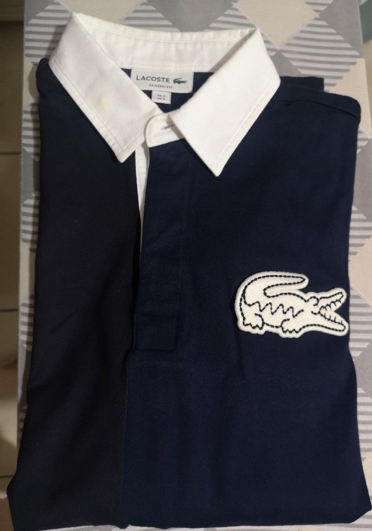 Lacoste rugby shirt (Category: Coats, Jackets and Outerwear) located in Mandaluyong City. Submitted by japs2 (Listing ID 1399106781, Image 1). Description: Lacoste rugby shirt Small size 3 Wore twice only BGC Mandaluyong area.