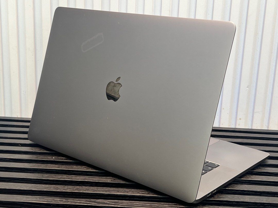 Macbook Pro 2018 15” core i9 32gb ram 512gb ssd (Category: Laptops & Notebooks) located in Makati City. Submitted by adam_son (Listing ID 1399080274, Image 3). Description: Model : Macbook Pro 2018 15 inches i9 32GB 512 gb SSD💻 Condition : Secondhand, no hidden issue, Smooth Performance, sticker mark(see photos) Price : ₱32,000 Only Quick Specifications - Processor: 2.9 GHz 6-Core intel Core i9 - 32 GB Memory RAM - 512 GB SSD Flash Storage - Bac