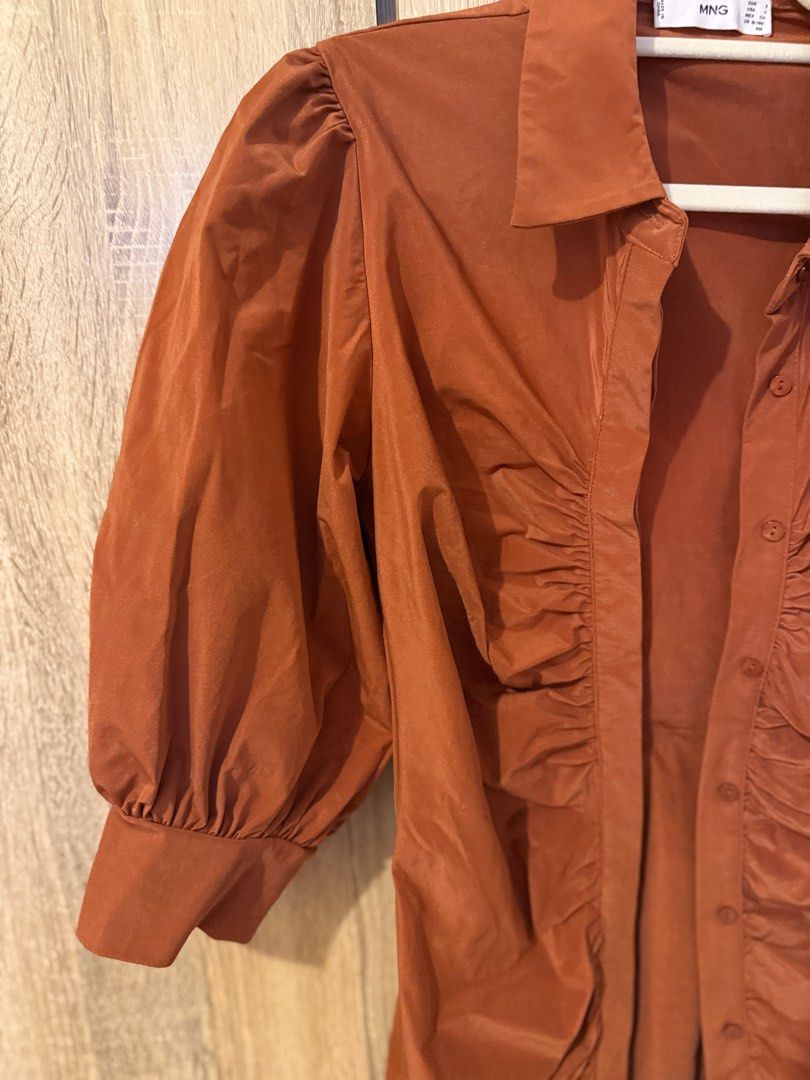 Mango Ruched Dress (Category: Dresses) located in Cebu City. Submitted by xishy (Listing ID 1399136542, Image 2). Description: - Mango dress in rich brown - Collared neckline - Button-down front - Ruched detailing - Puff sleeves - Flattering silhouette - Size S.