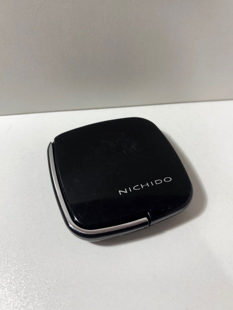 Nichido Powder Compact - Almond (Category: Makeup) located in Pasig City. Submitted by anne.rae (Listing ID 1399169555, Image 2). Description: Purchased and opened: 06-14-25 RFS: isn’t my shade match for a powder - Brand: Nichido - Shade: Almond - Includes: Mirror and light beige powder.