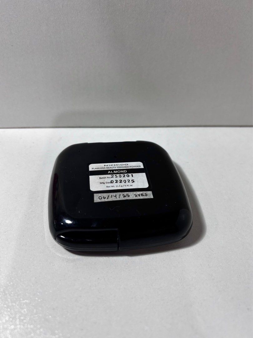 Nichido Powder Compact - Almond (Category: Makeup) located in Pasig City. Submitted by anne.rae (Listing ID 1399169555, Image 3). Description: Purchased and opened: 06-14-25 RFS: isn’t my shade match for a powder - Brand: Nichido - Shade: Almond - Includes: Mirror and light beige powder.