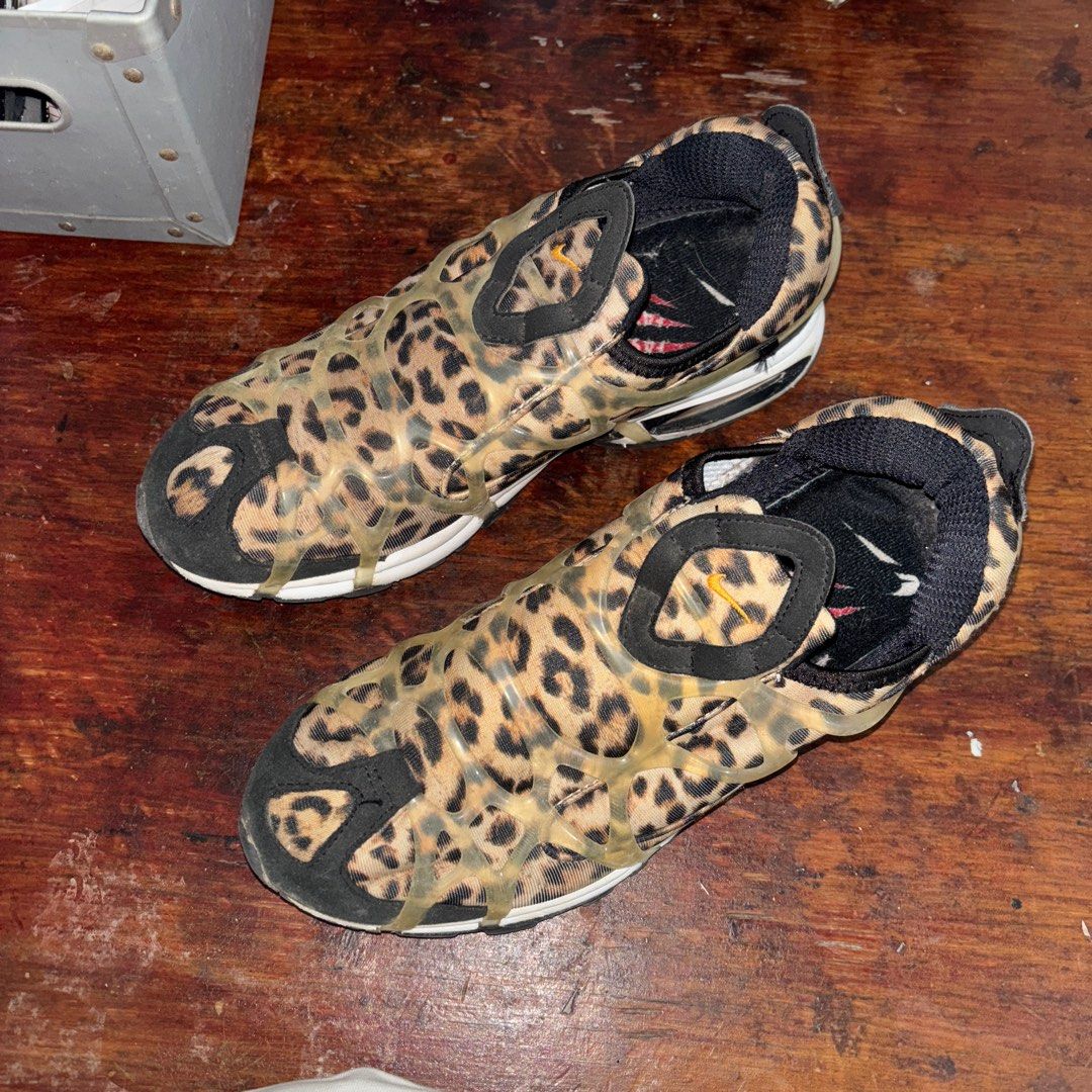 Nike Air Max 360 Leopard Print Sneakers (Category: Sneakers) located in Pasig City. Submitted by functionalrags (Listing ID 1399179629, Image 2). Description: - Nike Air Max 360 - US Size 8 - Leopard print design (black and tan) - Unique cage-like design - Made in Indonesia - Visible inner tag.
