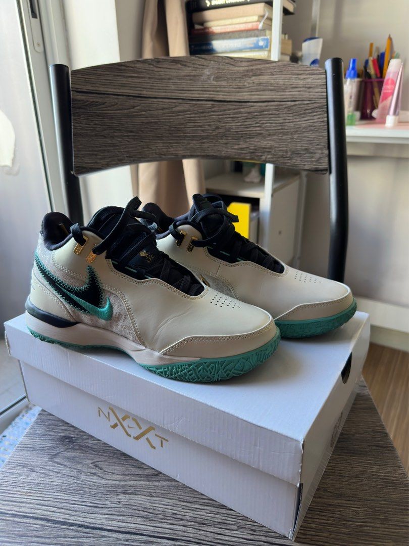 Nike LeBron NXXT Gen AMPD EP Sneakers (Category: Sneakers) located in Taguig. Submitted by _sprtukm (Listing ID 1399203439, Image 3). Description: - Nike LeBron NXXT Gen AMPD EP - Colorway: Cream and Teal - Black tongue and laces - Gold accents - Size: 5.5 - Includes original box.