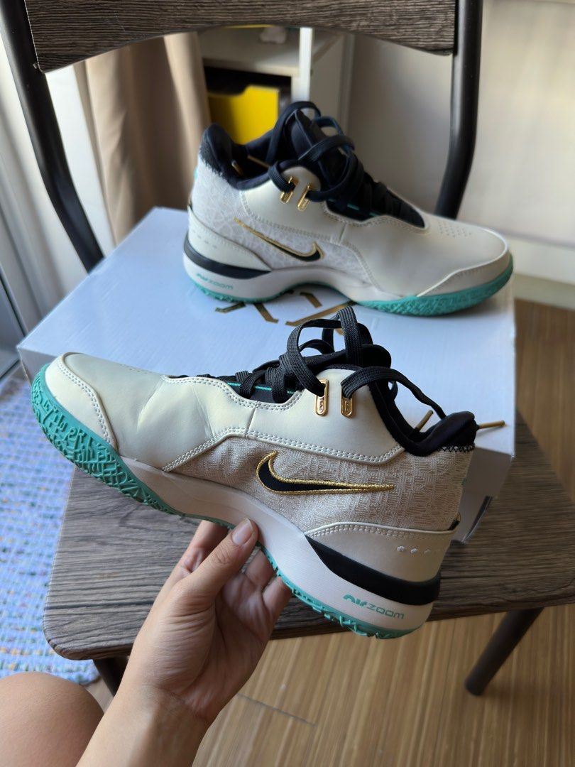 Nike LeBron NXXT Gen AMPD EP Sneakers (Category: Sneakers) located in Taguig. Submitted by _sprtukm (Listing ID 1399203439, Image 2). Description: - Nike LeBron NXXT Gen AMPD EP - Colorway: Cream and Teal - Black tongue and laces - Gold accents - Size: 5.5 - Includes original box.