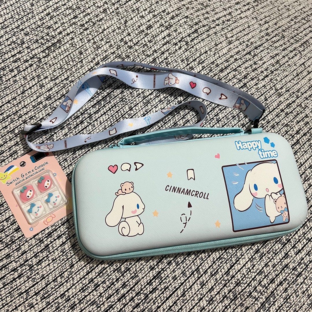 Nintendo Switch Pouch Bag & Joystick protective cover (Category: Cases & Covers) located in Imus. Submitted by vdc.apparel (Listing ID 1399160659, Image 3). Description: BRANDNEW!! Cute Cinnamoroll Nintendo Switch2(2025) Accessories Pouch Bag Card Case Dock Case With Crossbody Strap. & Joystick protective cover Product Description: carrying case takes your Nintendo Switch, Joy-cons, Joy-straps and your favorite games out easily and safely with yo