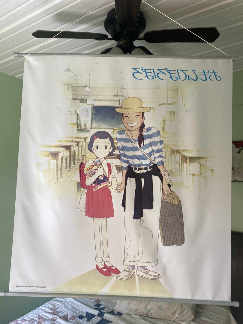 Only Yesterday Anime Poster (Category: Art & Prints) located in Cagayan de Oro. Submitted by caga67813 (Listing ID 1399083609, Image 2). Description: - Vintage "Only Yesterday" anime poster - Features a scene with two characters - Light-colored background - Mounted on a rod for easy display - Copyright: 1991 Okamoto Hotaru-Tone Yuko-TNHG.